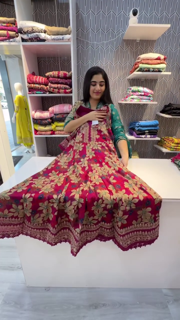 Floral Embroidered Anarkali Suit Set with Rich Dupatta Traditional Full-Length Gown Style in Wine Red and Teal Green Variants, Featuring Intricate Golden Threadwork, Flowing Silhouette, and Coordinated Chiffon Dupatta with Fine Detailing Perfect for Festive and Wedding Occasions